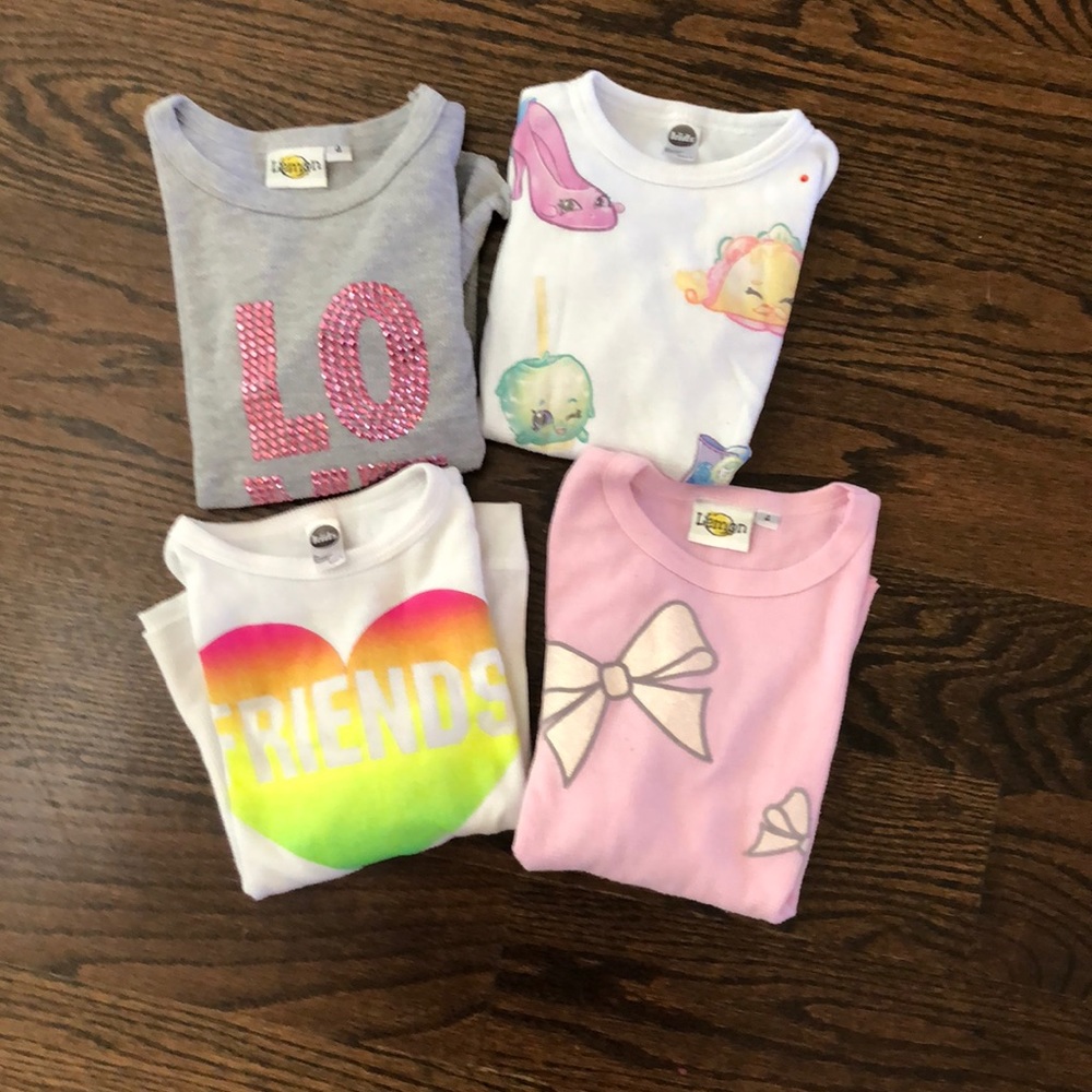 Assorted girls long sleeve shirts.